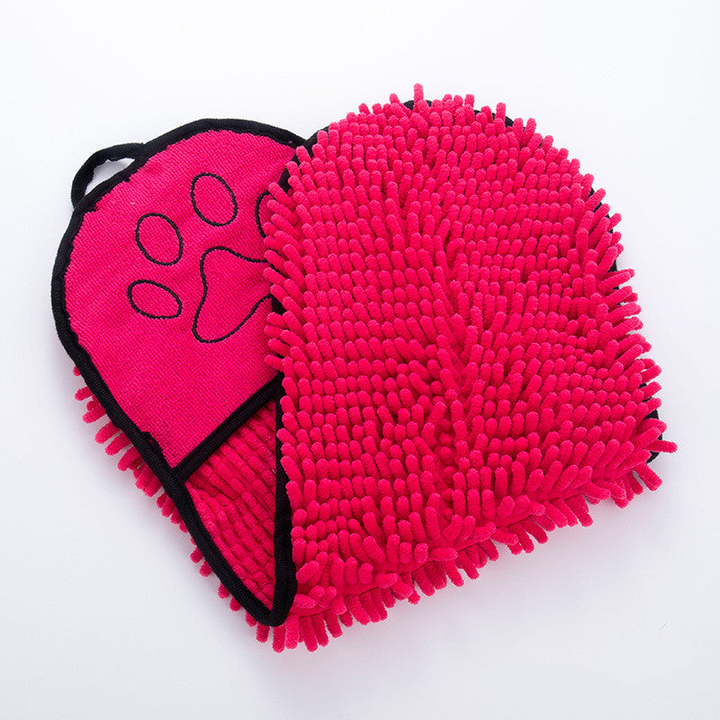  pink grooming mitt with a paw print on a white background