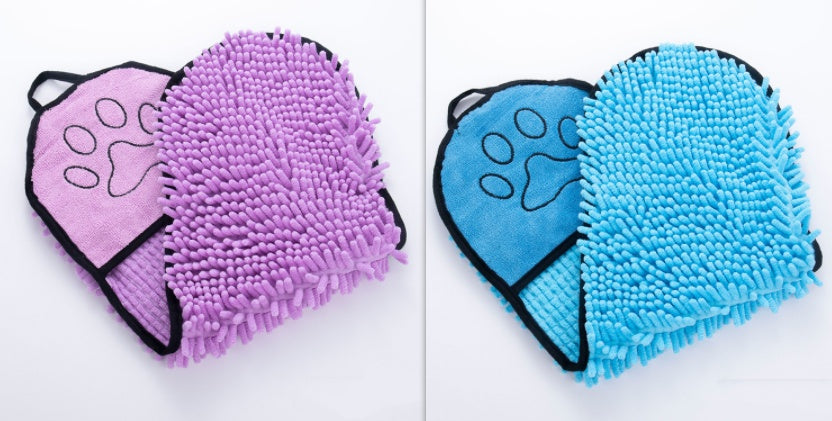 Purple and blue cleaning mitts with paw prints on a white background