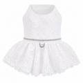 White lace dress with a belt on a white background