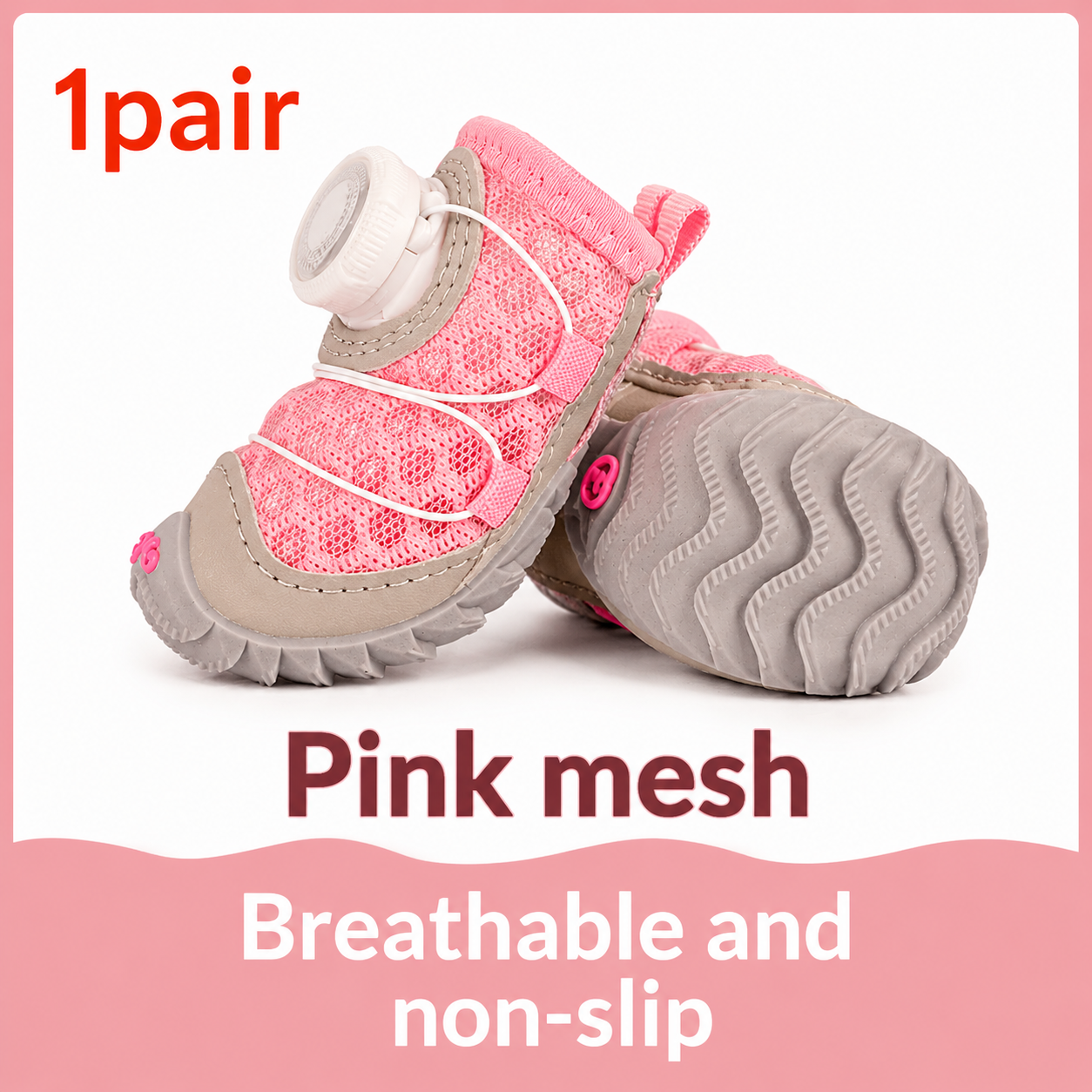 Pair of pink mesh baby shoes with beige soles on a white background