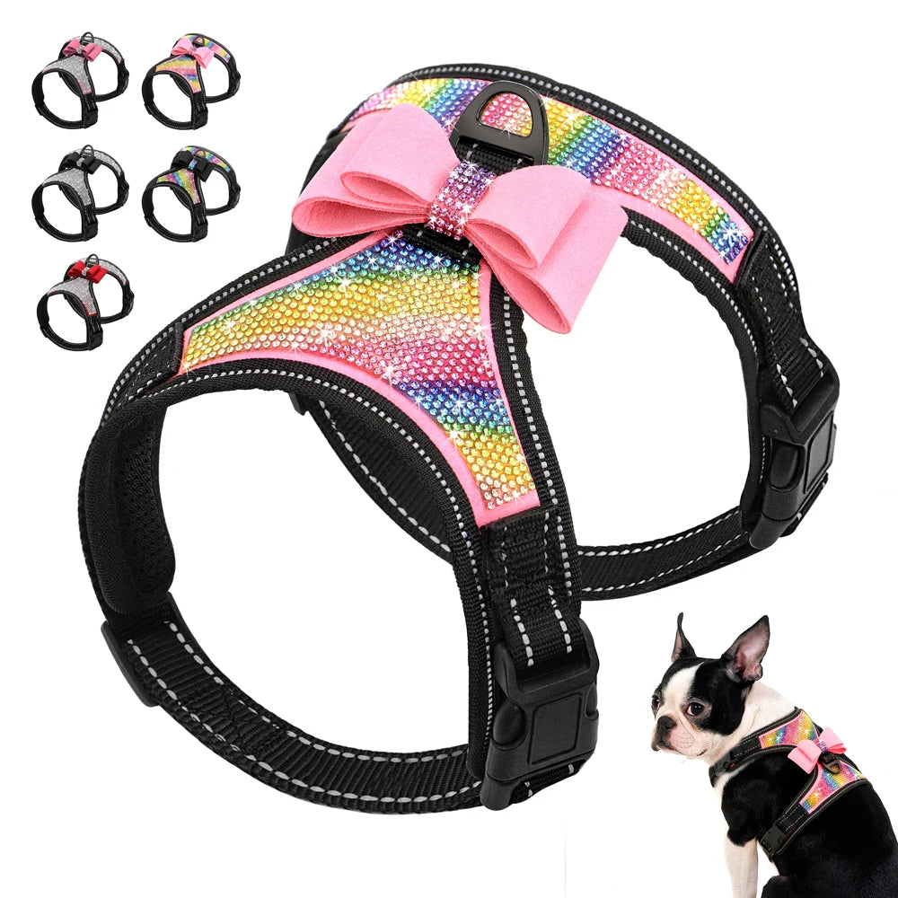 Dog harness with rainbow pattern and pink bow, suitable for small dogs.