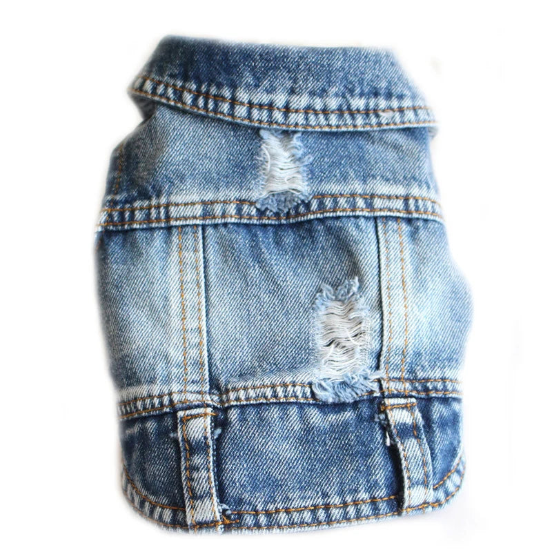 A light blue denim pet jacket with distressed rips and contrast stitching, shown against a plain white background.