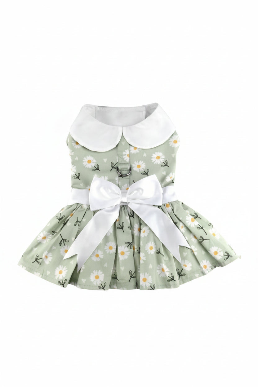 Green floral dress with white collar and bow on a white background