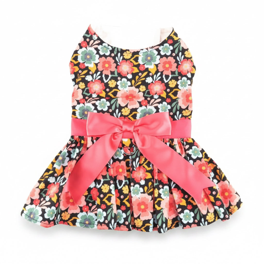 Floral dress with a large pink bow on a white background