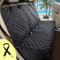 Black quilted car seat cover with a beach scene in the background