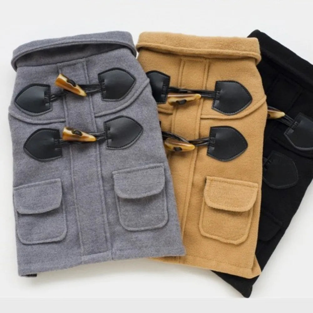Three pairs of gloves in gray, tan, and black on a white background