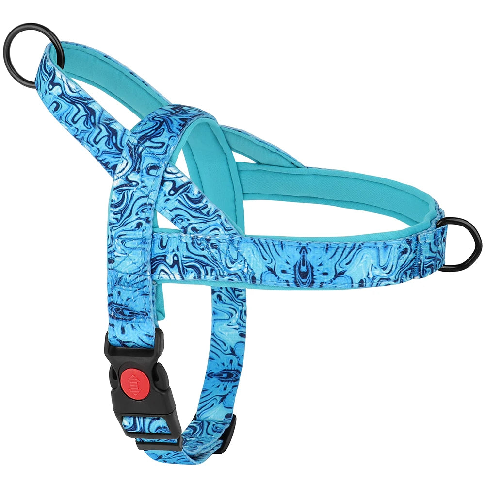 Blue patterned dog harness with black hardware on a white background