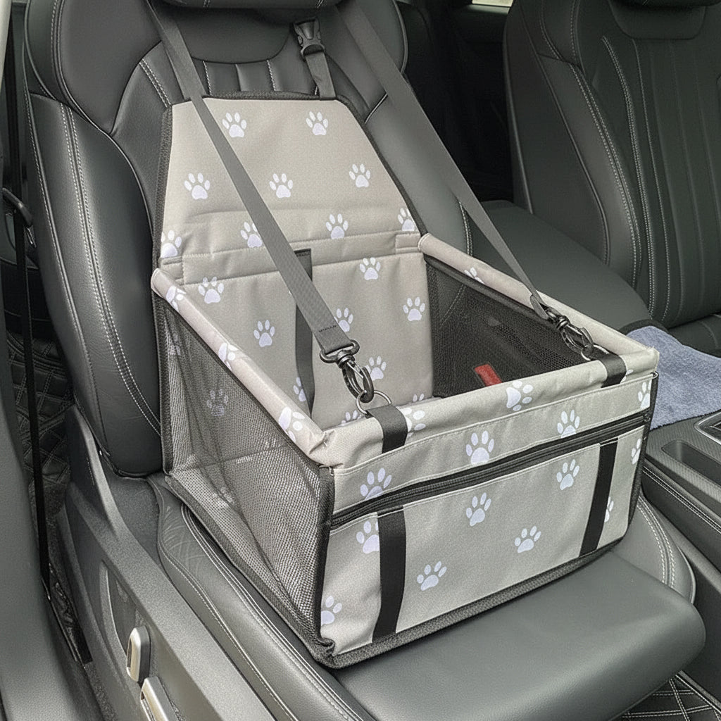 Pet car seat with paw print pattern on a car seat
