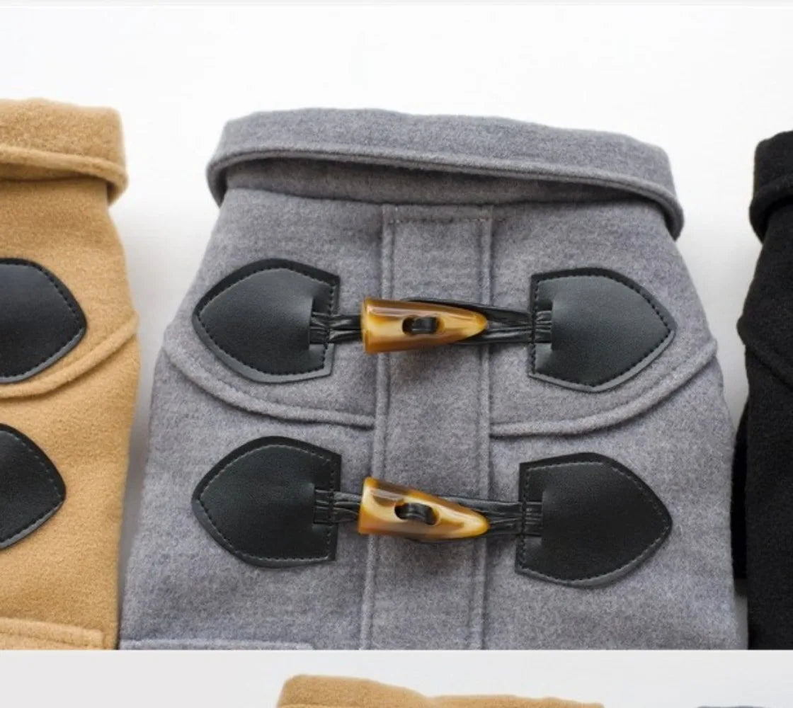 Gray pet coat with black and gold shovel-shaped decorations on a white background