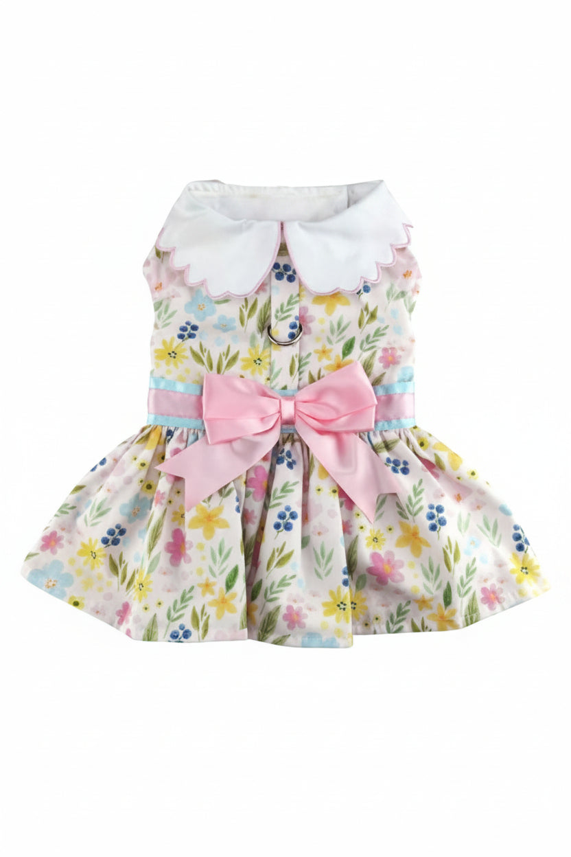 Floral dress with a pink bow for a dog on a white background