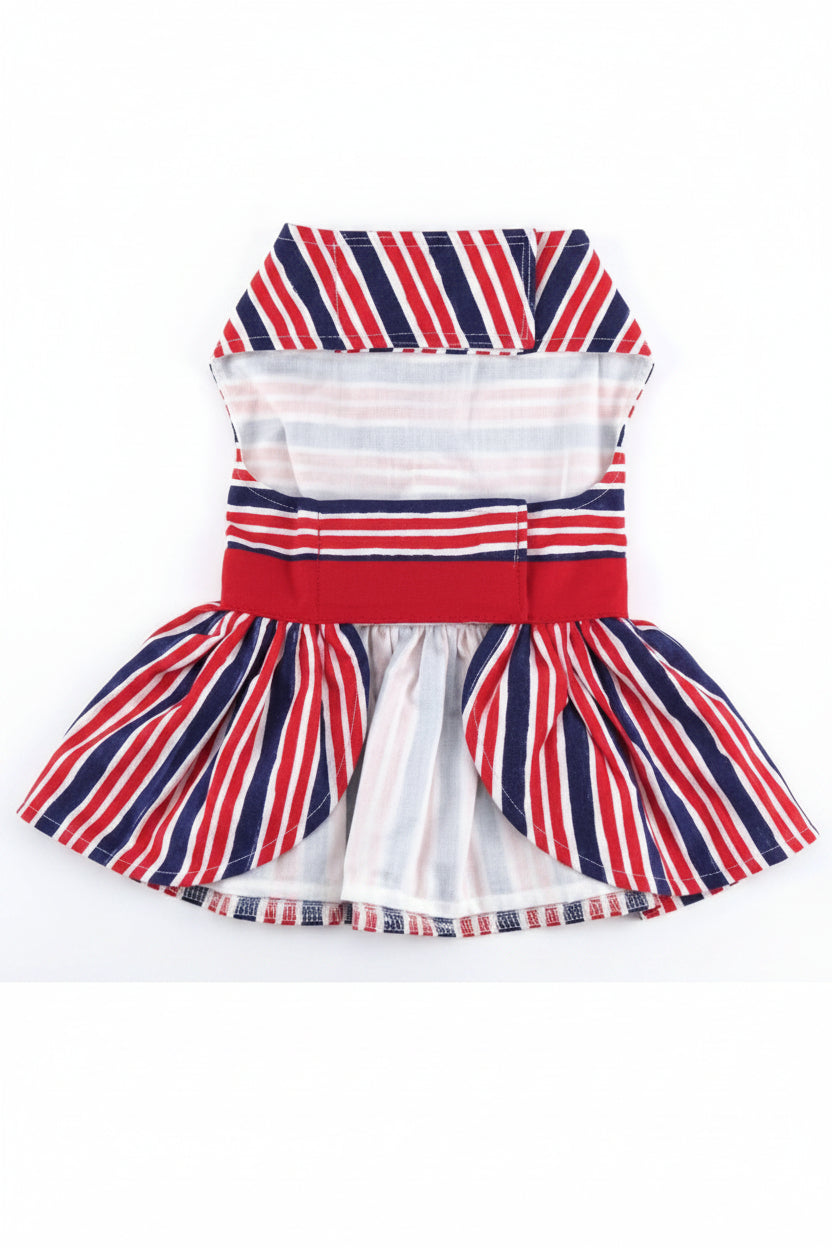 Dog dress with red, white, and blue striped pattern on a white background
