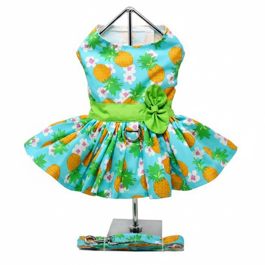 Colorful dog harness and leash set with pineapple pattern on a mannequin.