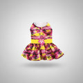 Colorful floral dress with a belt on a white background